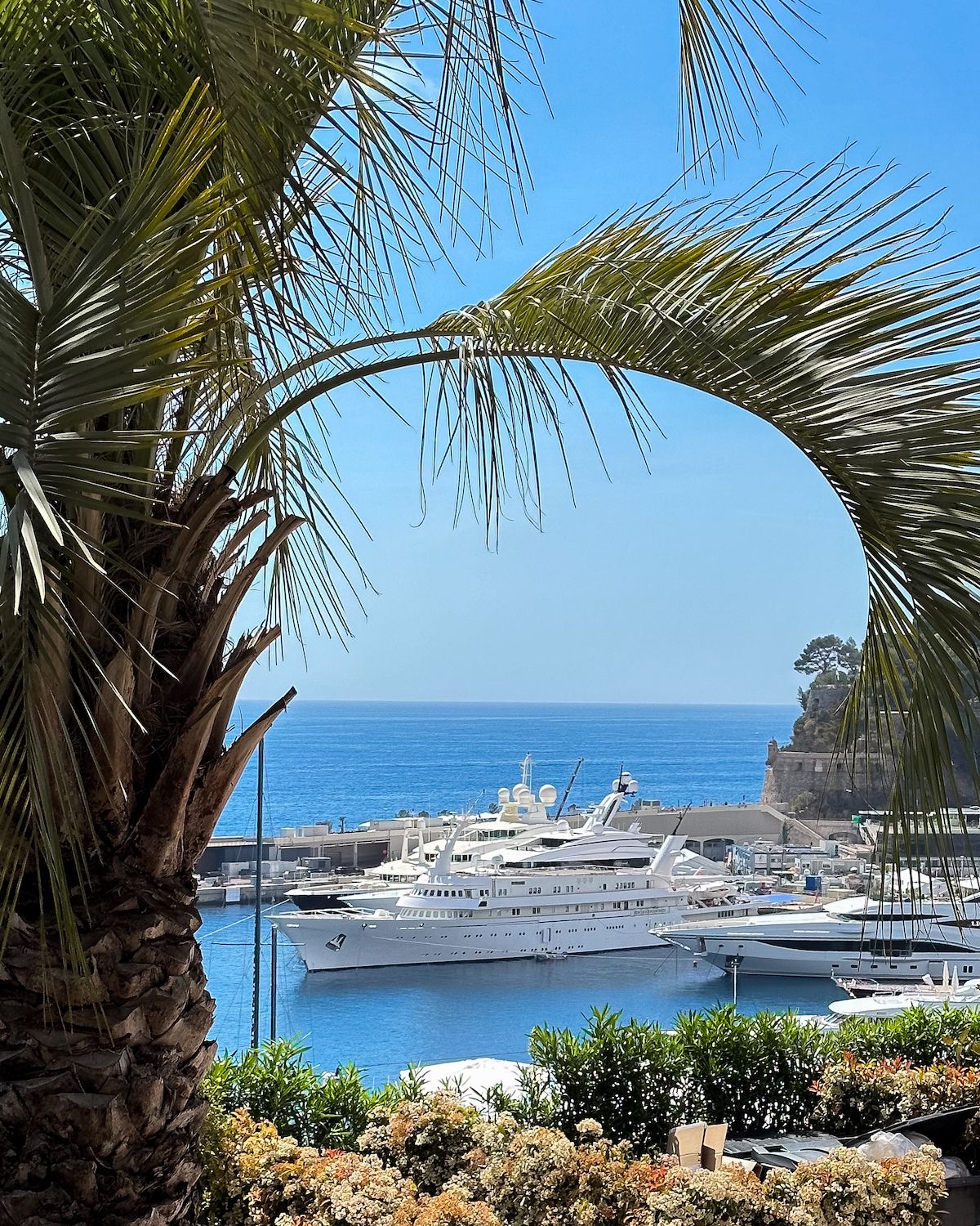 White mega yachts in Port Hercule harbour in Monte Carlo, Monaco