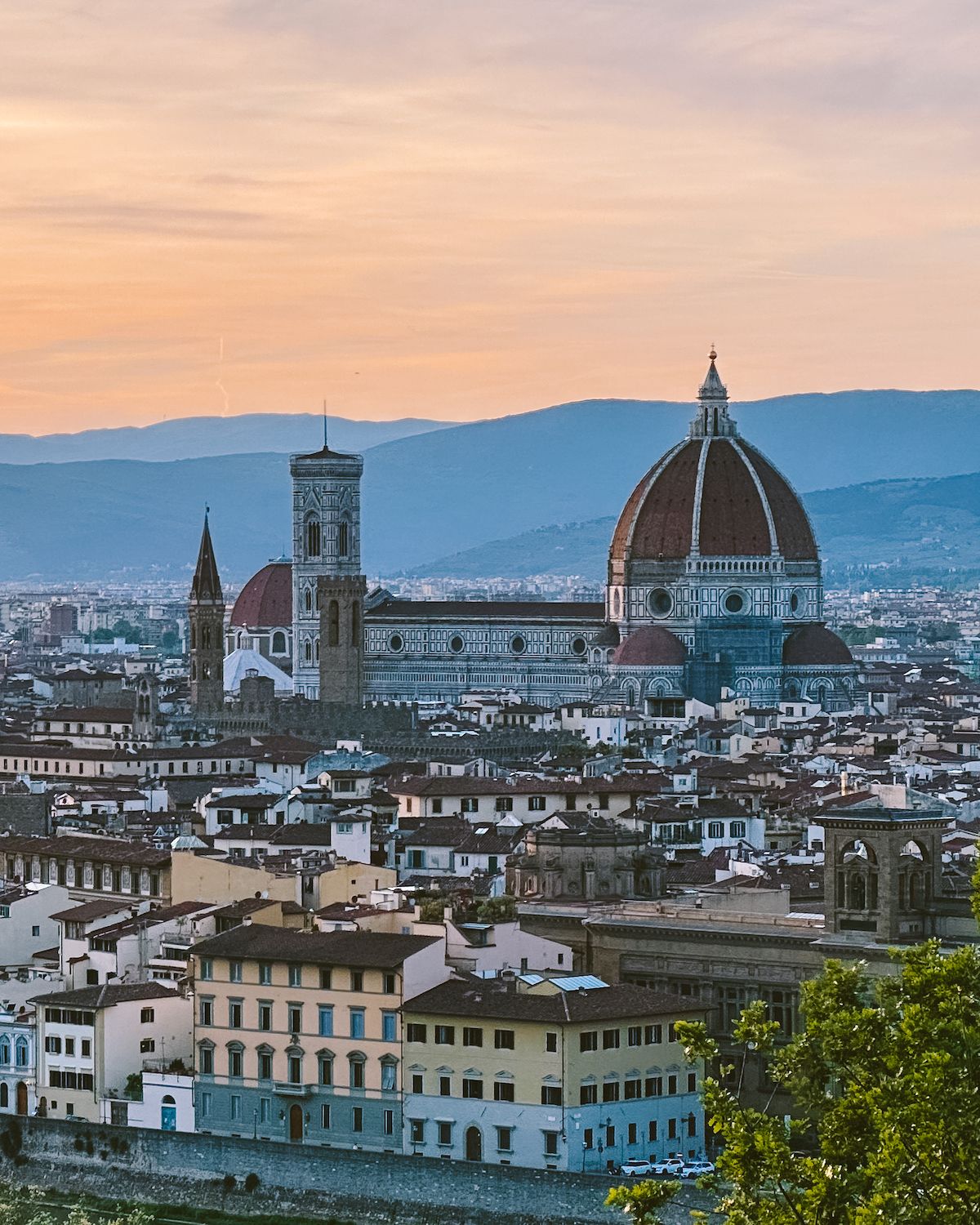Panoramic view of Florence and the iconic Duomo with its red curved roof
