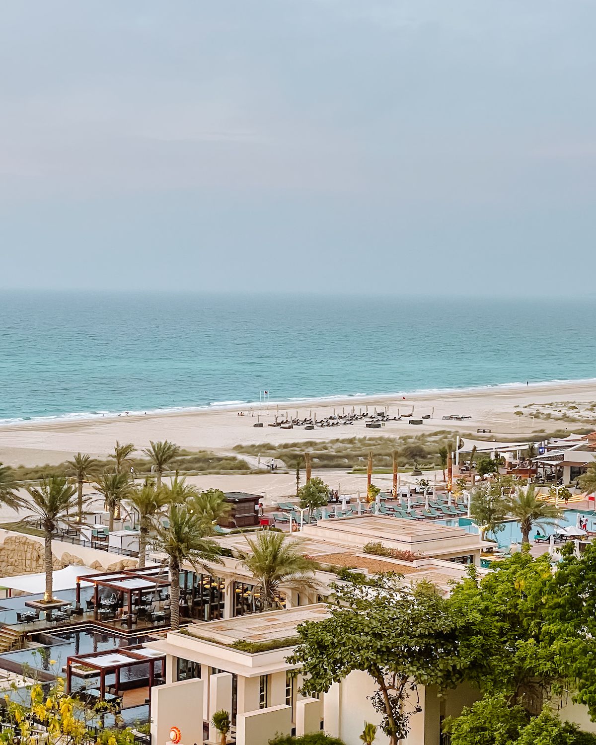 St. Regis Saadiyat Island Resort pool amenities overlooking the sea