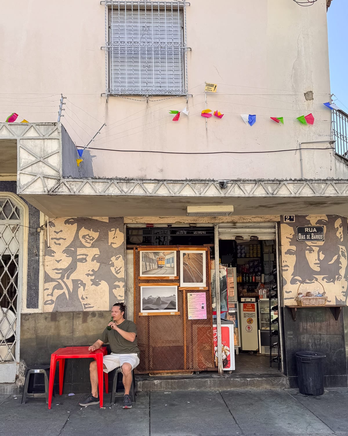 Ari having a drink in front of a convenience store bar in Santa Teresa, one of Rio's safer neighbourhoods.