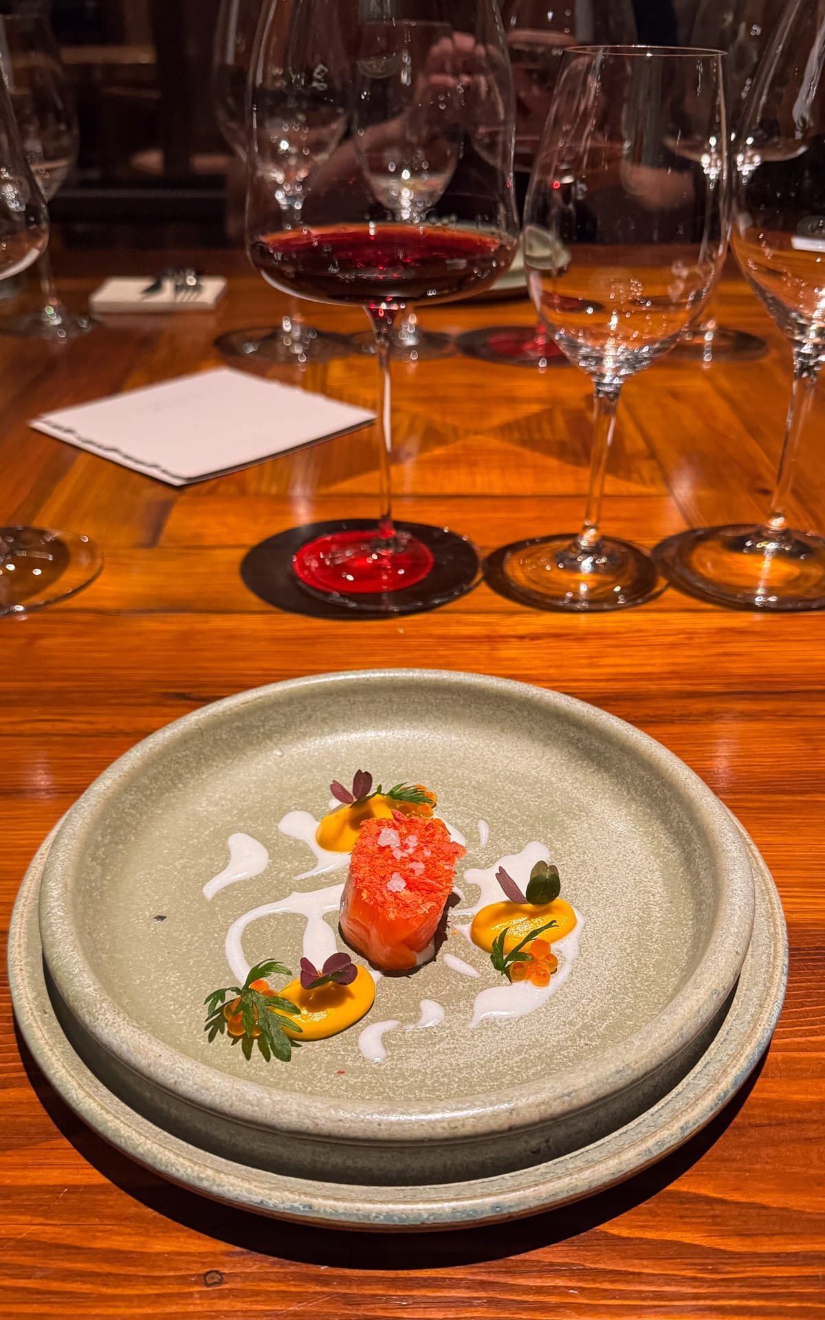 Beautifully plated dish of fish paired with Catena Zapata wine at Angelica Bistro.