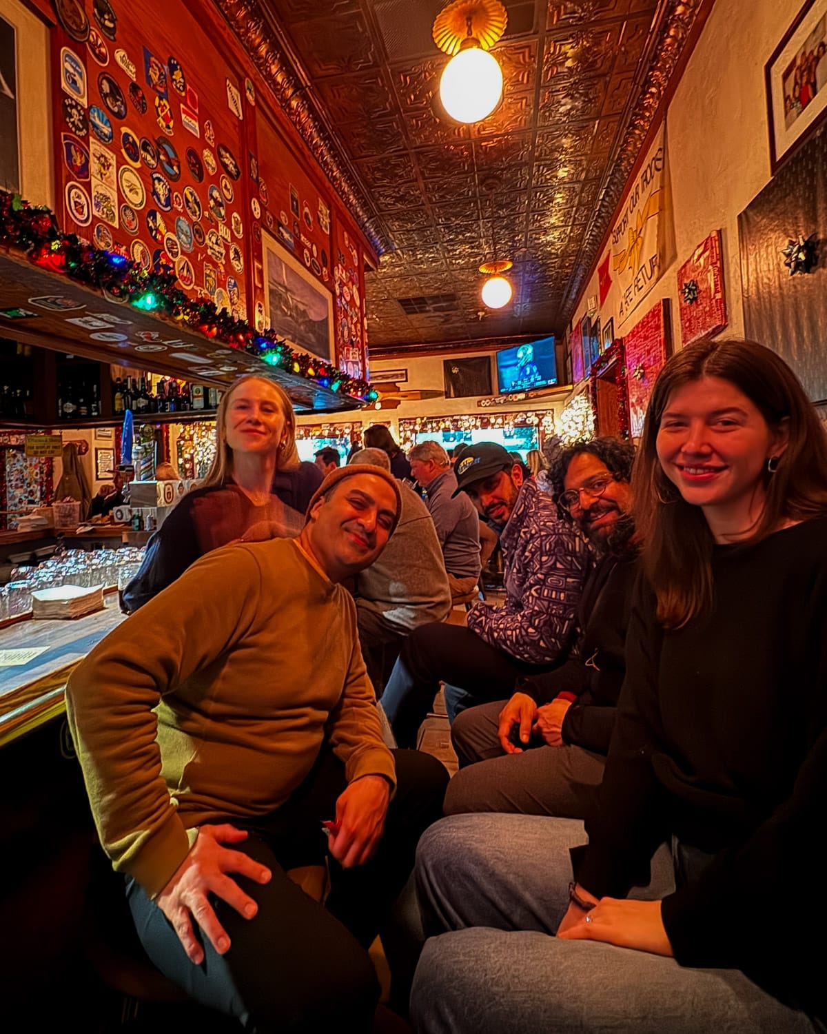 Group of friends seated at the lively F Street Station bar.