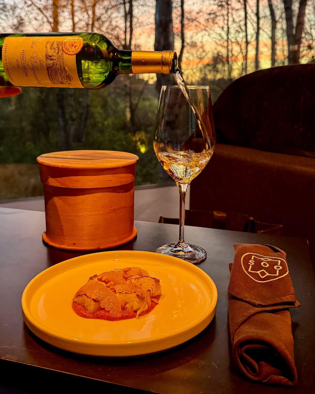 Fine-dining dish in the Kabi villa overlooking the forest at sunset at Maidla Nature Resort.